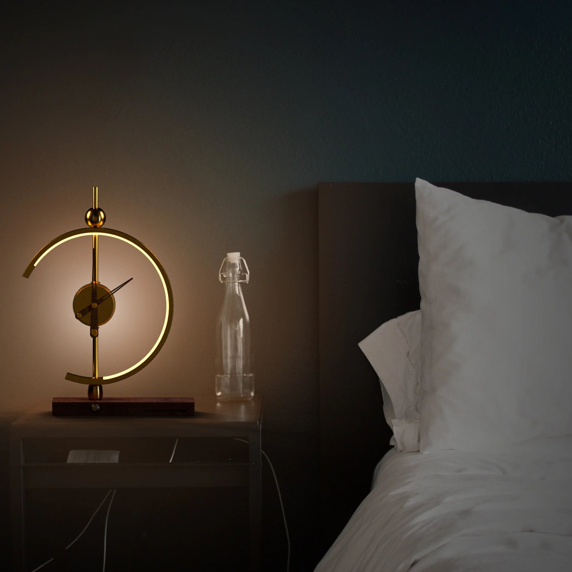 GoldenArc Desk Clock & Lamp – on nightstand, next to bed.