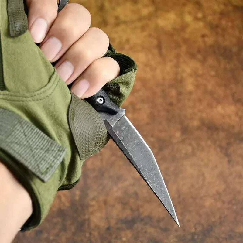 StealthEdge Tanto Neck Knife held in hand with tactical glove