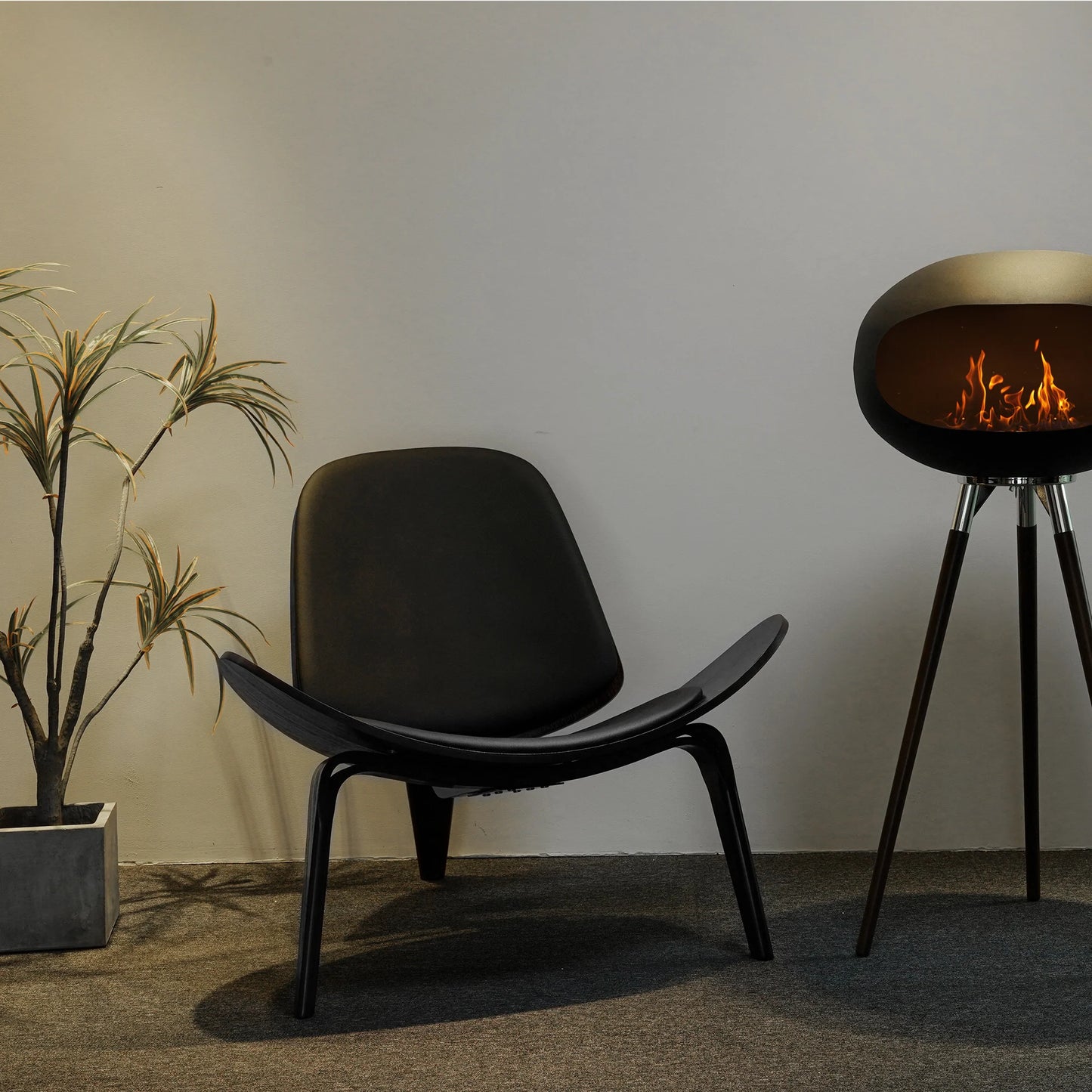 Rustic Flame Tripod Ethanol Fireplace providing cozy warmth in a modern lounge room setting.