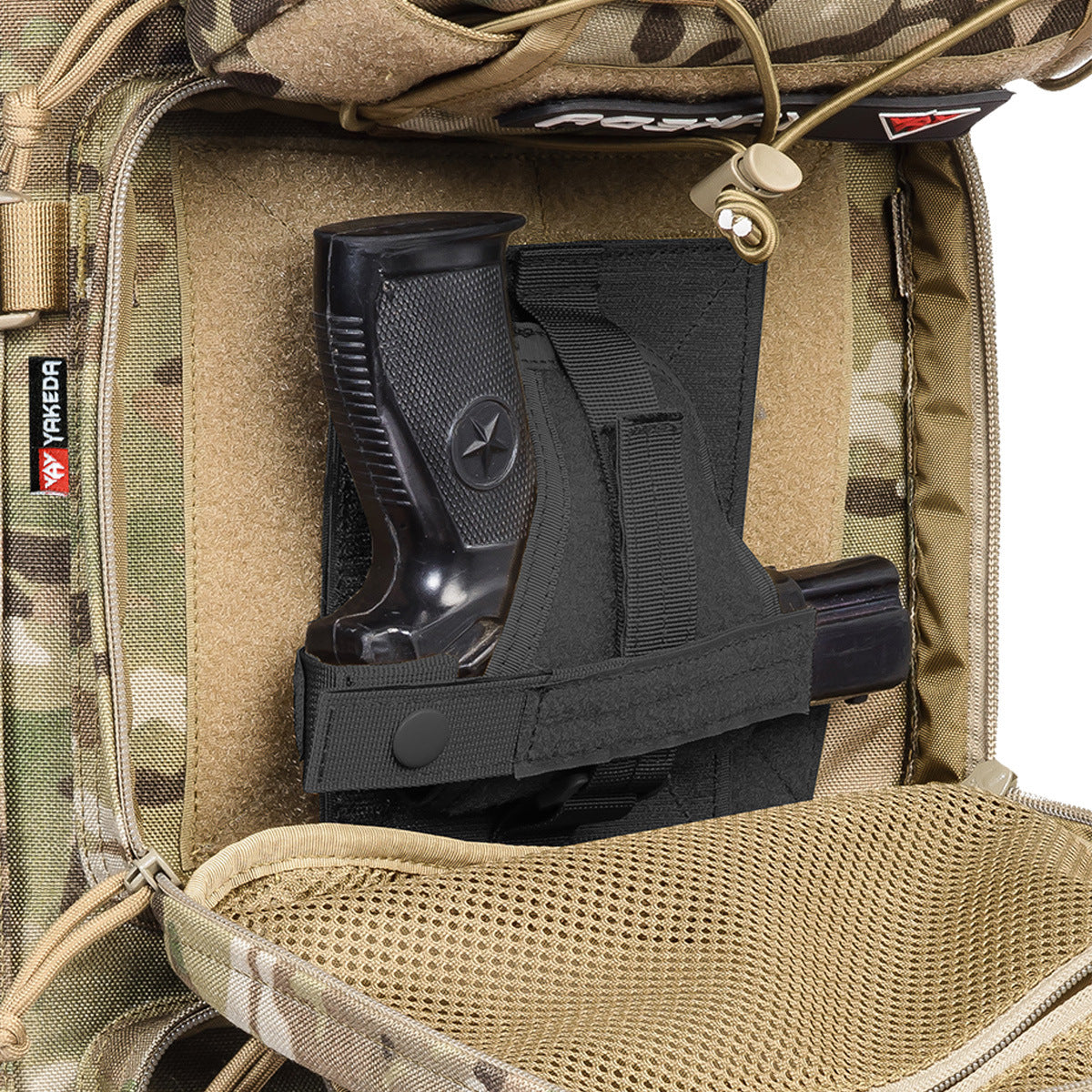 ConcealPro Hook & Loop Tactical Holster securely attached to a tactical backpack