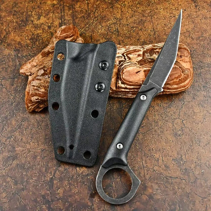 StealthEdge Tanto Neck Knife and Black Kydex Sheath on wood